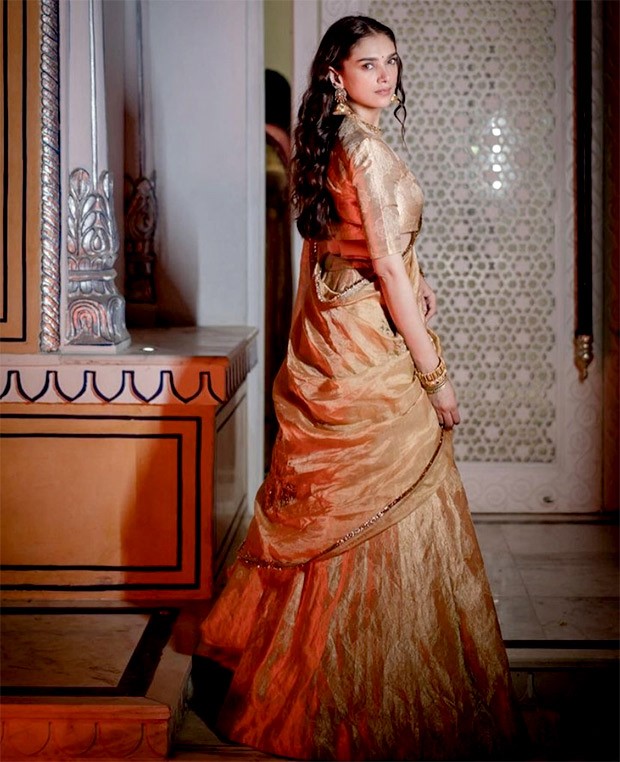 Aditi Rao Hydari exudes a royal charm in golden lehenga by Raw Mango