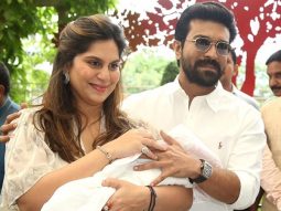 Ram Charan and Upasana Kamineni Konidela pose for the paps with their newborn daughter
