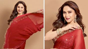 Madhuri Dixit is a picture of elegance in red and gold saree by Arpita Mehta