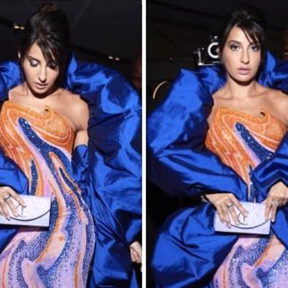 Nora Fatehi set the IIFA 2023 stage ablaze in an orange and blue swirl-embellished gown, with a captivating flouncy blue cape