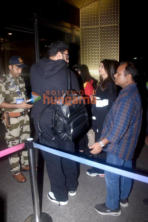 photos abhishek bachchan aishwarya rai bachchan and dino morea snapped at the airport 3
