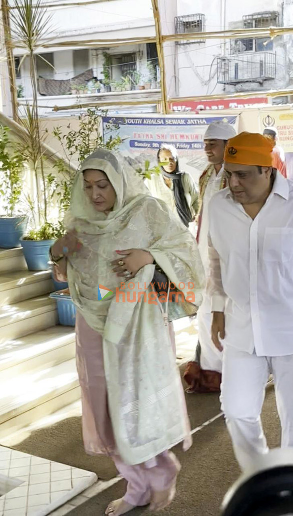 photos govinda snapped with his wife at late gufi paintals prayer meet 1