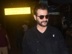 Sanjay Kapoor poses for a selfie with fans at the airport