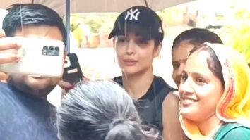 So humble! Malaika Arora waits to click selfie with fans despite pouring rain