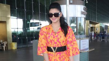 Urvashi Rautela looks gorgeous as always dressed in an orange outfit