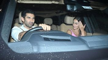 Ananya Panday playfully hides her face during a drive with rumoured beau Aditya Roy Kapur
