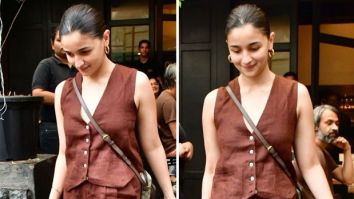 Alia Bhatt perfects the relaxed elegant look with casual brown pants and a waistcoat, together with a Gucci bag costing Rs. 1.35 lakh
