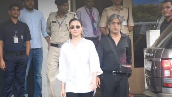 Alia Bhatt rocks a white oversized shirt as she gets clicked at the airport