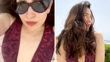 Karisma Kapoor in a maroon snakeskin patterned monokini is the most stylish beach babe
