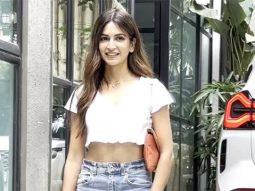 Kriti Kharbanda flashes a bright smile for paps dressed in white crop top & denims