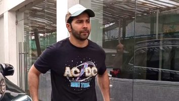 Varun Dhawan poses for a selfie with fans as he gets clicked in the city