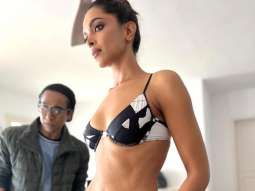 Deepika Padukone raising mercury levels with her toned physique in black & white swimsuit