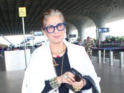 Dimple Kapadia gets clicked by paps at the airport