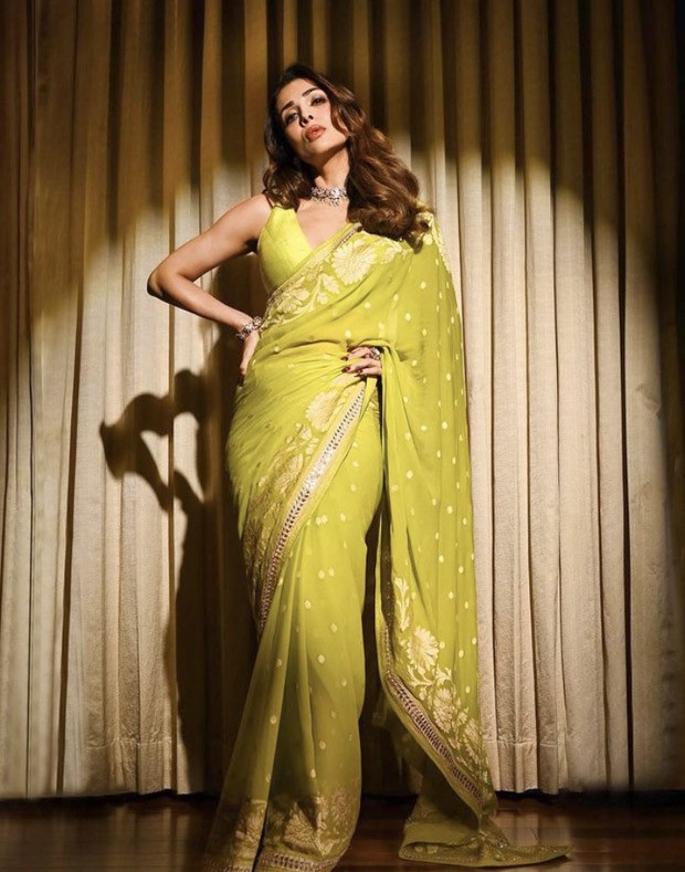 Malaika Arora is a picture of ethnic grace in lime green saree by Anita Dongre worth Rs.75,000