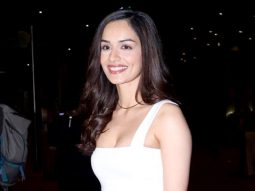 Manushi Chhillar poses with fans at the airport as she gets clicked
