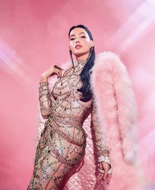 Nora Fatehi’s studded catsuit and pink fur jacket looks high on drama and higher on glam