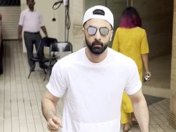 Ranbir Kapoor waves at paps sporting a white tshirt and denims