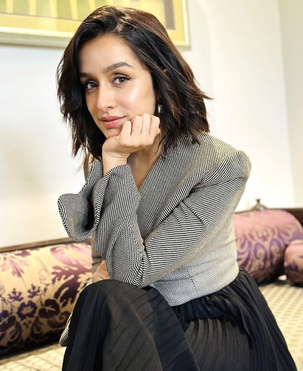 Shraddha Kapoor sways through style with a pleated perfection in black pleated skirt and buttoned top