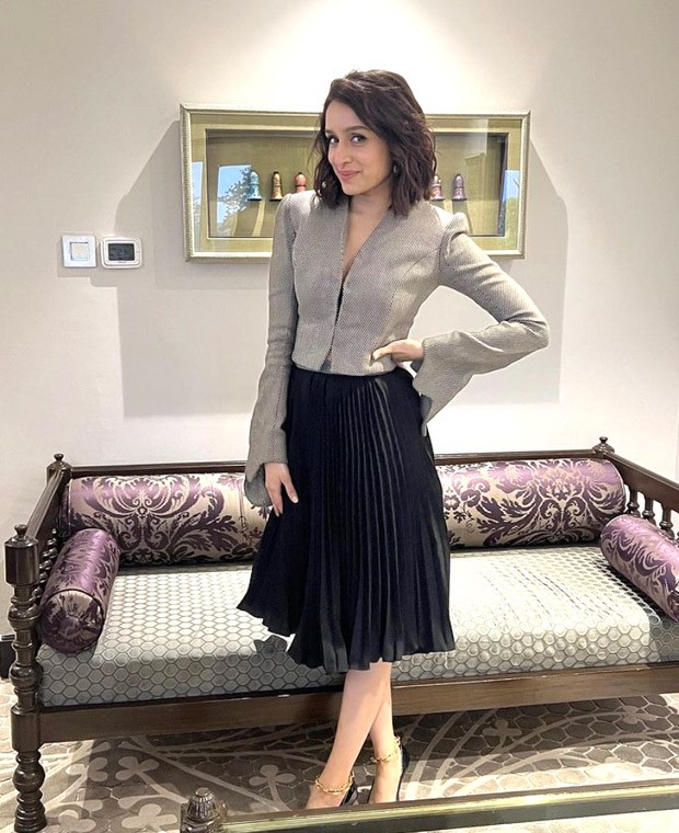 Shraddha Kapoor sways through style with a pleated perfection in black pleated skirt and buttoned top