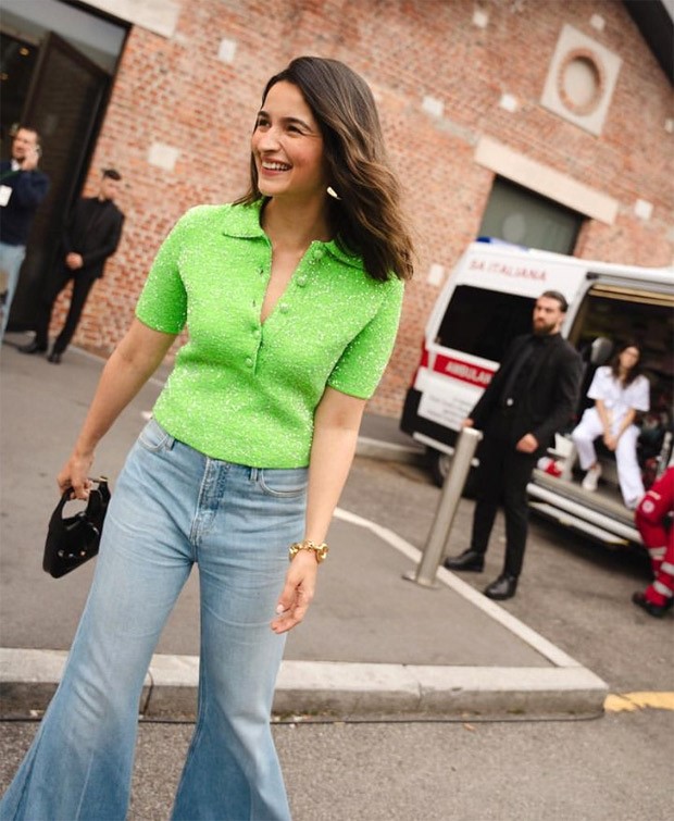 Alia Bhatt's choice of a neon green top at Gucci's SS24 show effortlessly embodies the essence of casual chic