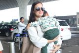 Dia Mirza gets clicked with her little munchkin at the airport