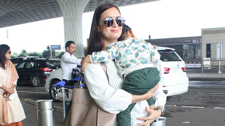 Dia Mirza gets clicked with her little munchkin at the airport