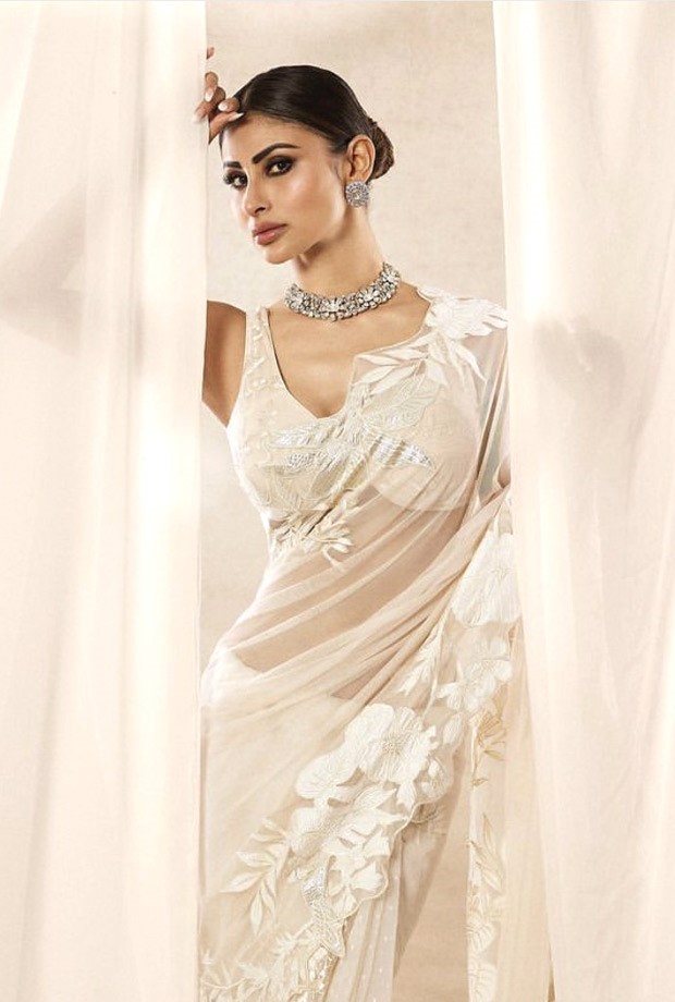 Mouni Roy channels her inner desi diva in an ethereal white saree by Rohit Bal