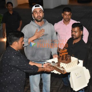 Photos: Ranbir Kapoor snapped cutting cake with fans and the media outside his Bandra home