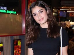 Rasha Thadani poses with fans as she gets clicked at the airport