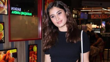 Rasha Thadani poses with fans as she gets clicked at the airport