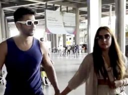Varun Dhawan & Natasha Dalal walk hand in hand as they get clicked at the airport