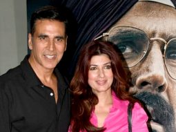 Akshay Kumar poses with wife Twinkle Khanna in front of Mission Raniganj poster