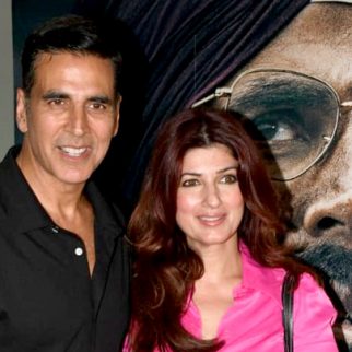 Akshay Kumar poses with wife Twinkle Khanna in front of Mission Raniganj poster