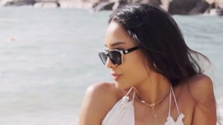 Beach baby! Lisa Haydon looks divine in white