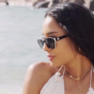 Beach baby! Lisa Haydon looks divine in white