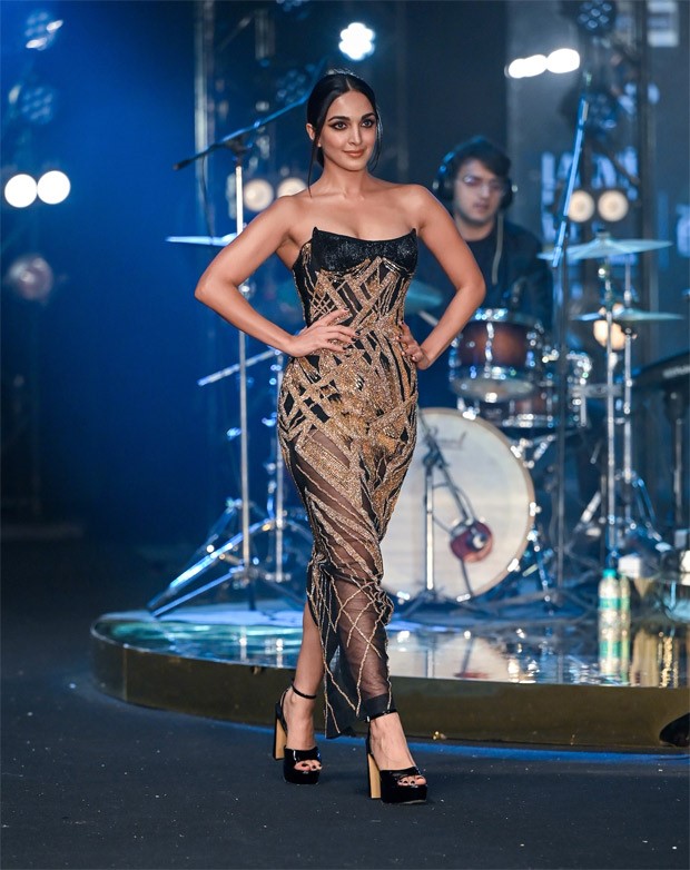 Kiara Advani sizzled as she graced the ramp for Falguni & Shane Peacock at Lakme Fashion Week, donning a stunning black and golden bodycon gown