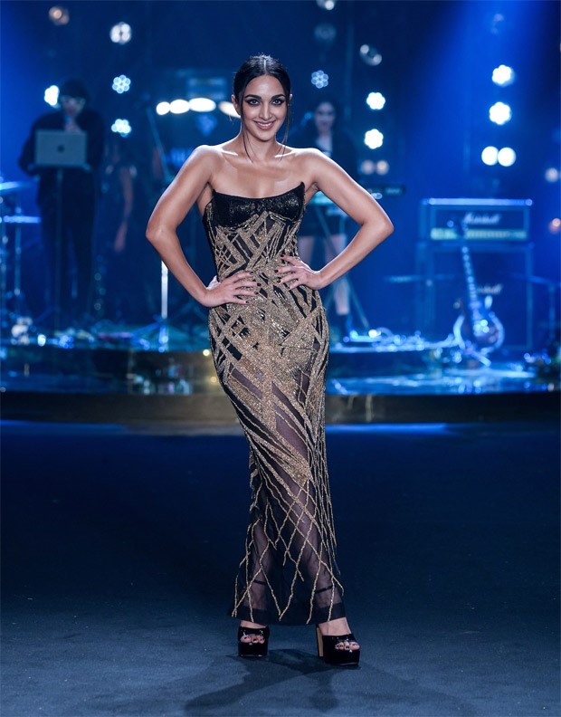 Kiara Advani sizzled as she graced the ramp for Falguni & Shane Peacock at Lakme Fashion Week, donning a stunning black and golden bodycon gown