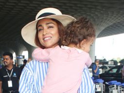 Shriya Saran gets clicked with daughter Radha at the airport