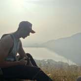 Kartik Aaryan relaxes atop a hill amid Chandu Champion shoot, see photo