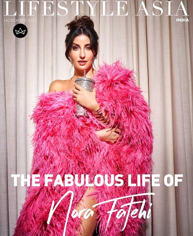 Nora Fatehi mesmerizes in a pink feather jacket, gracing the cover of Lifestyle Asia with unparalleled grace