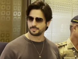 Sidharth Malhotra smiles as he gets clicked by paps at the airport