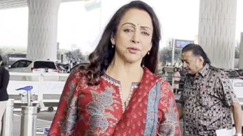 Dream Girl Hema Malini strikes a pose for paps at the airport