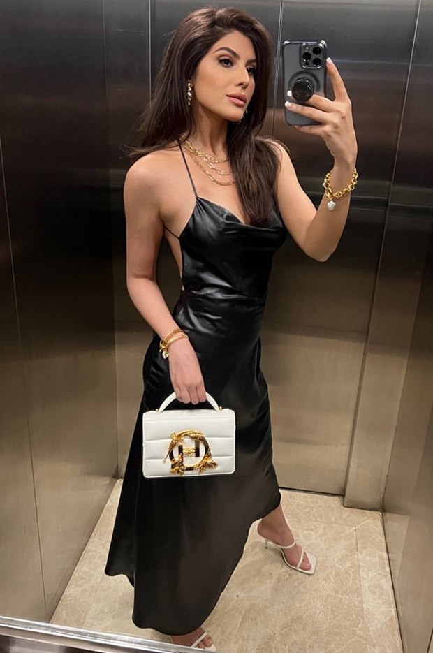 FASHION FACE OFF: Bollywood beauties Katrina Kaif and Elnaz Norouzi set the red carpet ablaze in matching black leather dresses at the Archie's premiere