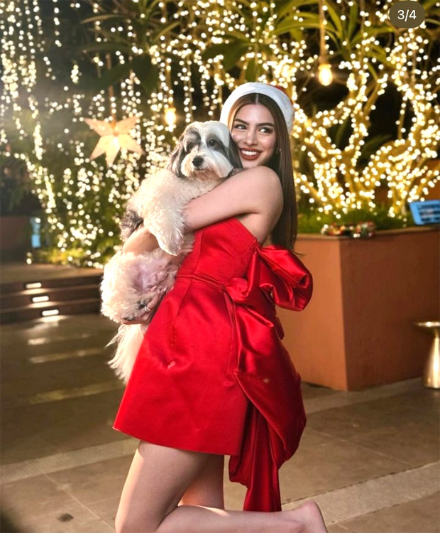 Khushi Kapoor dazzles in a bold red strapless gown, spreading Christmas cheer with her glamorous style