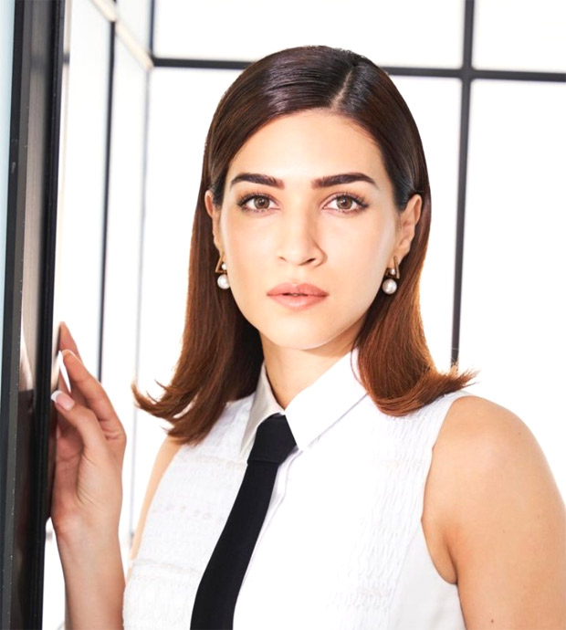 Kriti Sanon slays the style game in a chic white collared top paired with a sleek black slit skirt