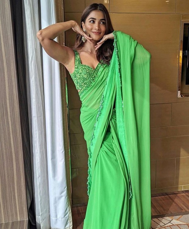 Pooja Hegde infuses a breath of fresh air into ethnic fashion with her stunning appearance in a green saree