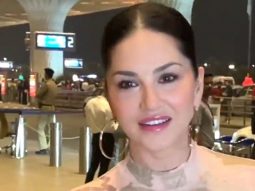 Sunny Leone flashes her infectious smile at the airport as she gets clicked by paps