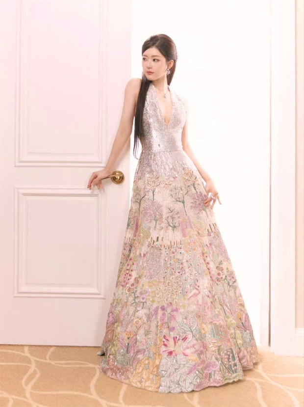 Zhao Lusi, Chinese actress, radiates glamour in Indian designer Rahul Mishra's silver halter gown with delicate floral embroidery