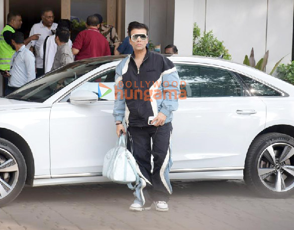 photos karan johar snapped at kalina airport 2