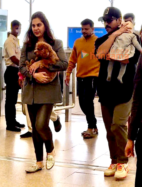 photos ram charan and upasana kamineni snapped at hyderabad airport 3